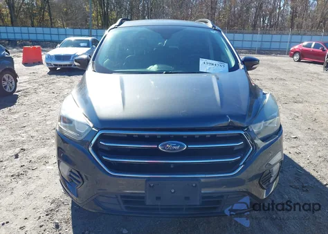2017 Ford Escape Titanium z USA, uszkodzony, nr VIN 1FMCU0J98HUA93249